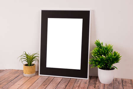 White picture frame with decorations. Mock up for your photo or text. Place your work, print art,...