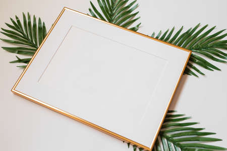 Gold picture frame with decorations. Mock up for your photo or text. Place your work, print art,...