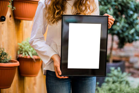 Gold picture frame with decorations. Mock up for your photo or text. Place your work, print art,...