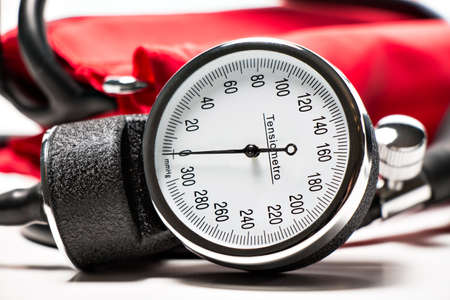 red Blood pressure cuff, close-up isolatedの写真素材