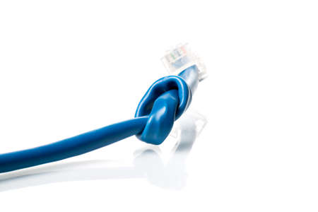 on computer keyboard lying  a combination lock and a USB flash driveの写真素材