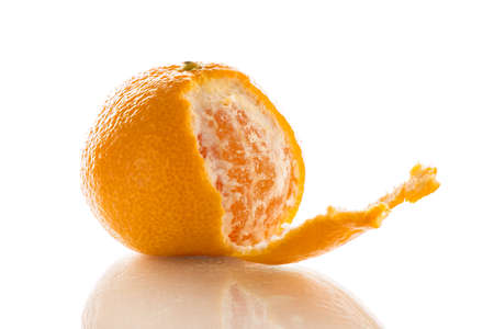 Mandarin Citrus reticulata is peeled, detailed picture isolatedの写真素材