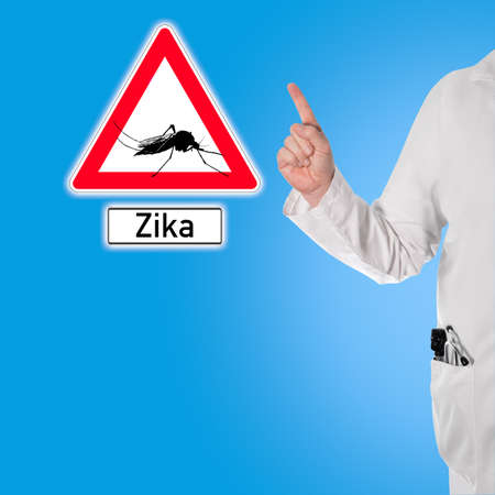 Doctor warns of dengue next to a sign with a mosquito and the text Zikaの写真素材
