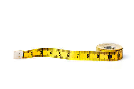 Yellow white tailor tape measure to take measurements and measure