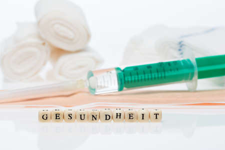 Health, word written with cubes, and stethoscopeの写真素材