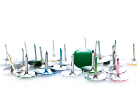 Tack ticks, colorful tacks on white background