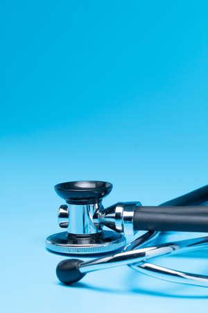 Stethoscope, close-up isolated with blue backgroundの写真素材