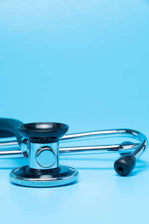 Stethoscope, close-up isolated with blue backgroundの写真素材