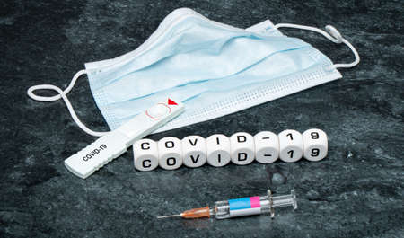 COVID-19, reminder to vaccinate, vaccination card syringe