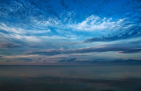 Blue sea, sky and clouds