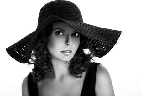 Portrait of a beautiful woman in a hat
