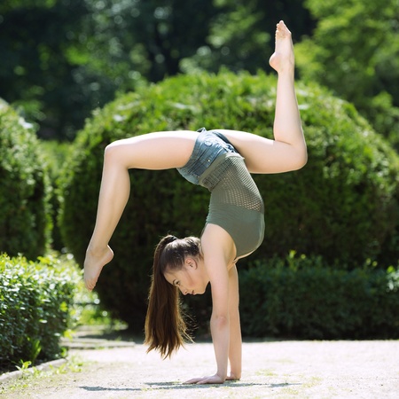Beautiful gymnast exercise outdoor