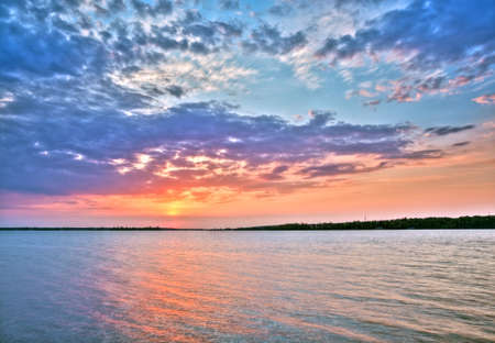 Beautiful sunset over the lake HDR-high dynamic range の写真素材