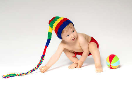 Sweet toddler with a ballの写真素材