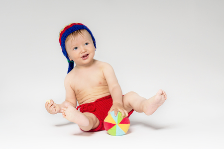 Sweet toddler with a ballの写真素材