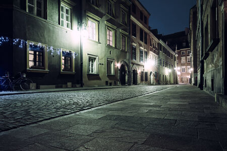 The street of the old town in Warsaw at nightの写真素材