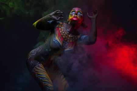 Bodypainting. Woman painted with ethnic patterns