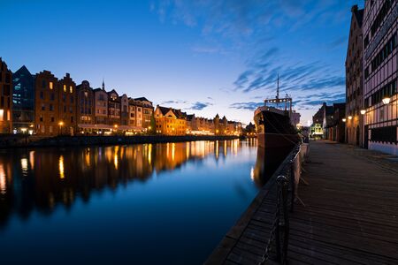 View of the old city of Gda?sk and the Motlawa River at night
