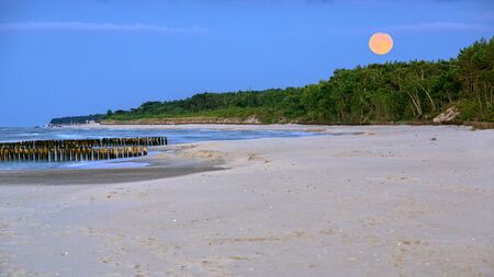 Moonrise on the beach on the Baltic sea. HDR - high dynamic rangeの写真素材