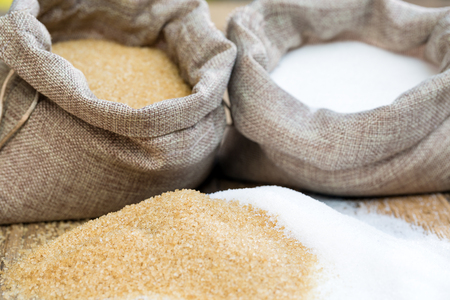 Various types of sugar, brown sugar and whiteの写真素材