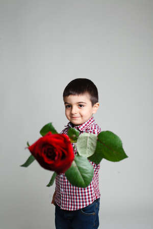 Little boy with red rose valentines ,sonの写真素材
