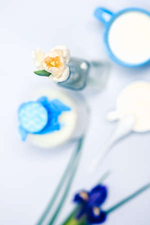 Still life with milk, dairy products,flowers, white tulipsの写真素材