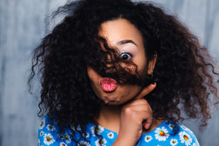 portrait of real funny face african womanの写真素材