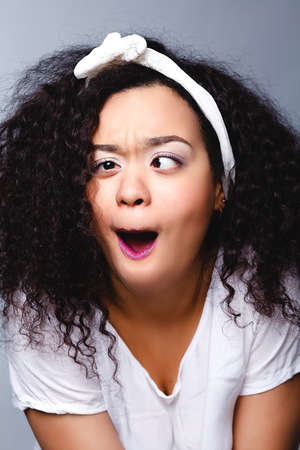 portrait of real funny face african womanの写真素材