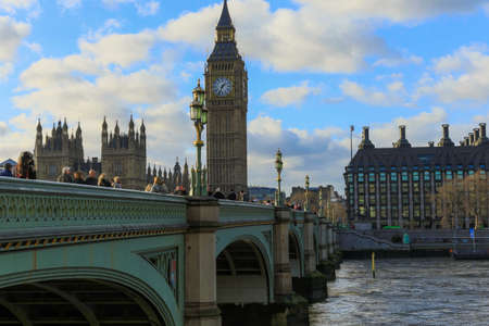 Big Ben with bridge and with flying birdsの写真素材