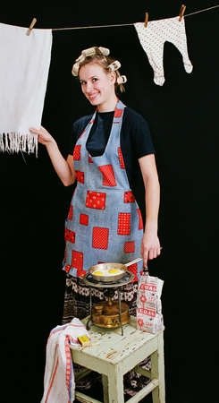 Typical everyday woman cooking in kitchen 6の写真素材