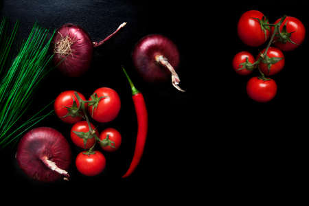 mix of different vegetables on a dark backgroundの写真素材