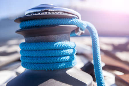 Winch with blue rope on a yacht
