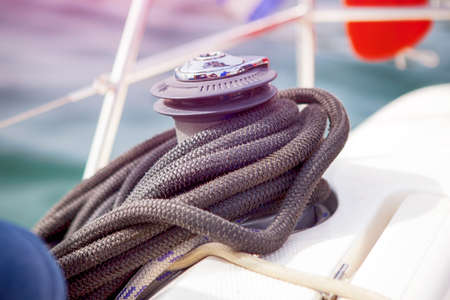 Winch with blue rope on a yacht