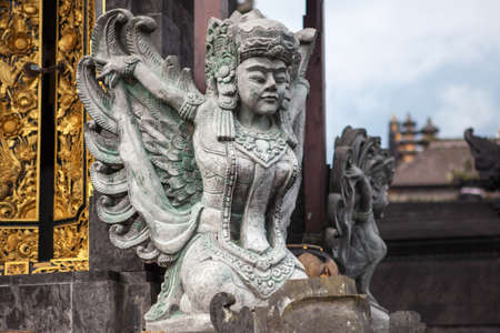 Stone sculpture on entrance door of the Temple in Baliの写真素材