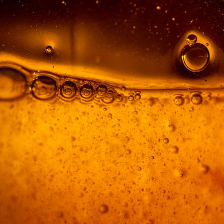 bubbles under water on yellow background