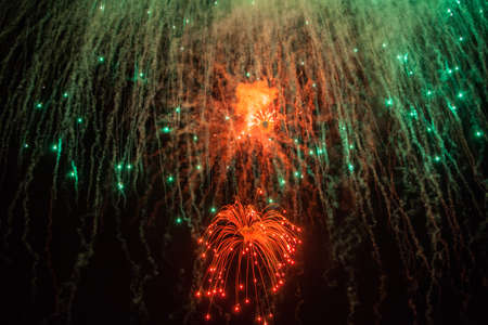 fireworks explosions in the night sky. Close-up. Holiday concept