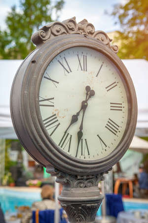 Large public outdoor old antique clock in the parkの写真素材