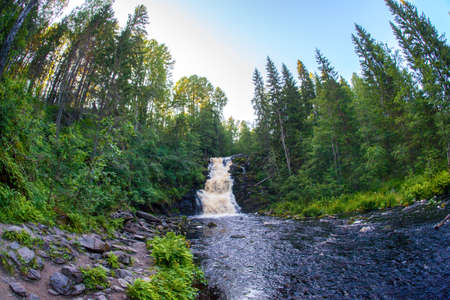 Waterfall hidden in the tropical jungleの写真素材