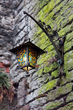 old street lamp on the houseの写真素材