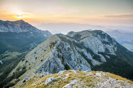 orange sunset in mountains. Montenegro.の写真素材