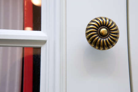 The door knob is made of copper. It is both sturdy and durable, but it looks very old.の写真素材