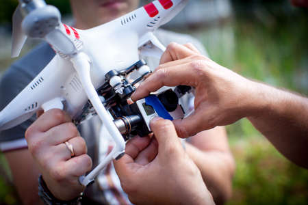 Set up drone camera with hand of professional
