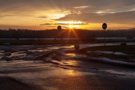 sunset over a bad road in Europeの写真素材