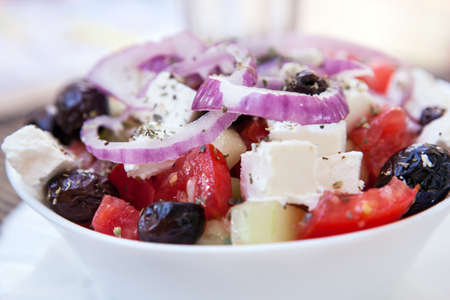 greek salad healthy food fresh vegetable in a white plateの写真素材