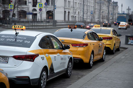 Moscow, Russia - January 15, 2020: Modern car of Yandex Taxi company in the parking lot on city...