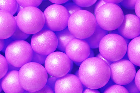 This picture with little plastic beads can be used as background.の写真素材