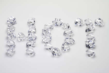 The word HOT is written with small ice cubes.の写真素材