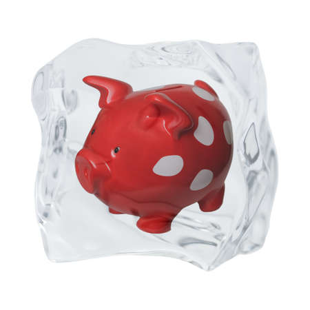 An irregularly shaped ice cube is released on a white background.の写真素材