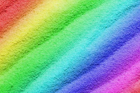 Colorful sand as the background image with wave-shaped structure の写真素材