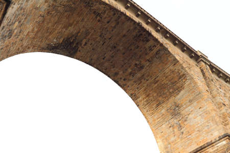 A with stones masonry arch spans across the sky の写真素材